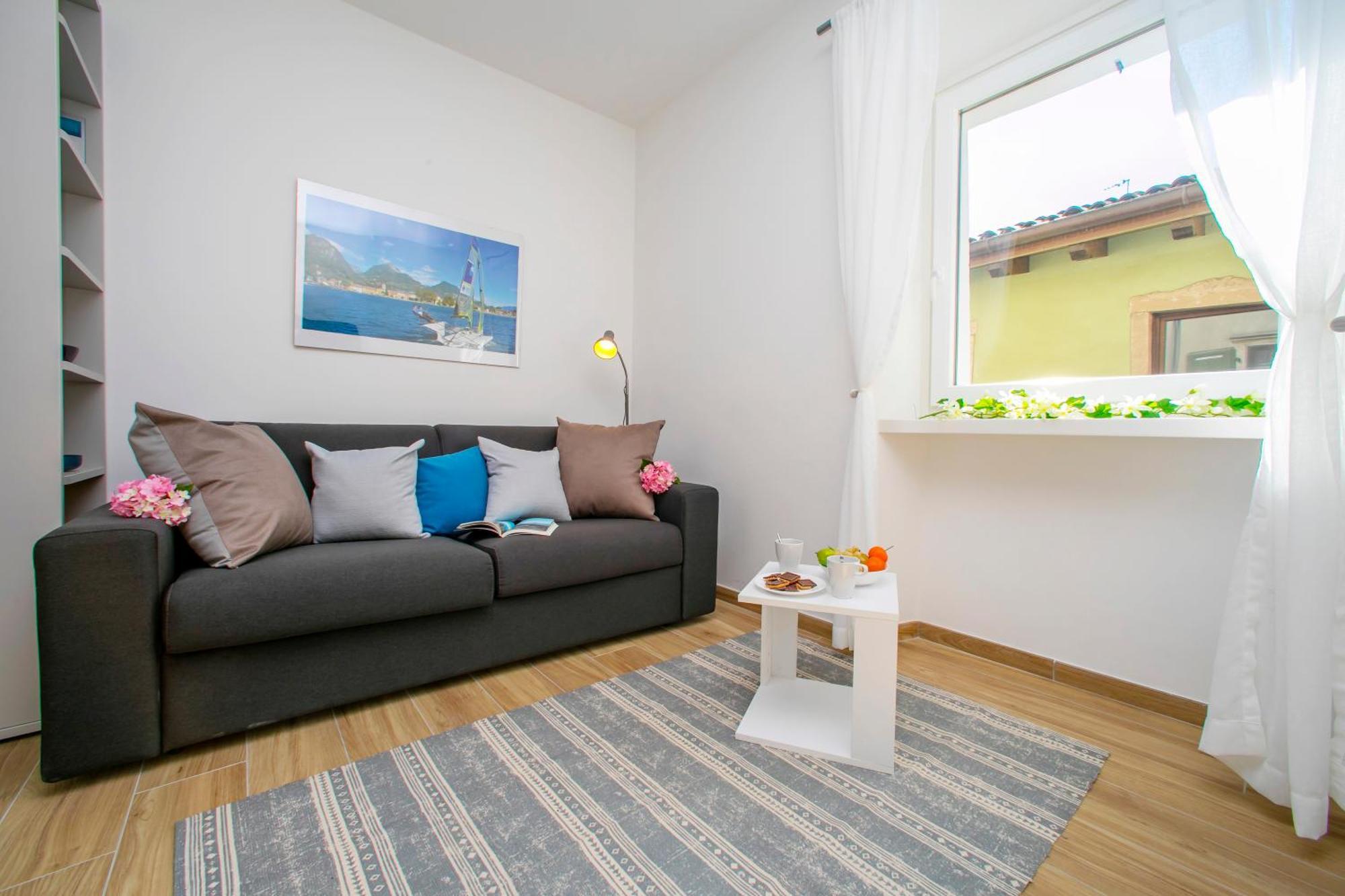 Nido Sui Tetti Di Riva Del Garda - Happy Rentals Exterior foto